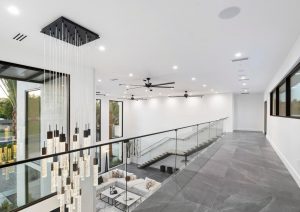 7TH AVE FLOATING STAIRS AND GLASS BALCONY